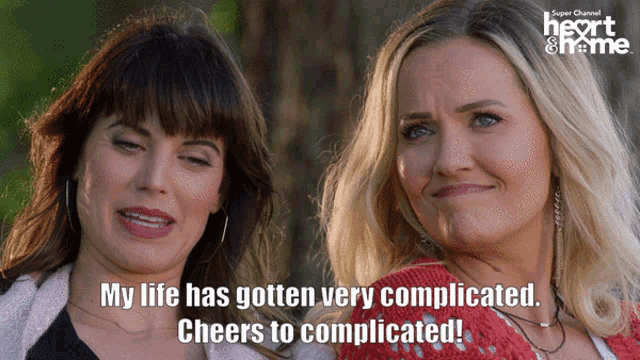 two women are standing next to each other with a caption that says my life has gotten very complicated