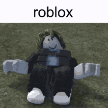 a roblox character is sitting in the grass with his arms outstretched