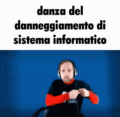 a man wearing headphones is dancing in front of a blue background