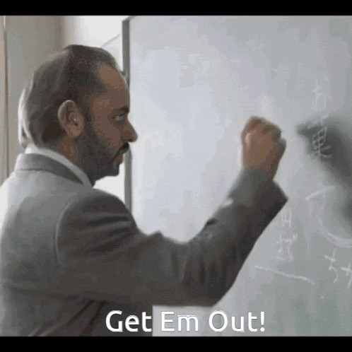 a man writing on a white board with the words get em out written below him