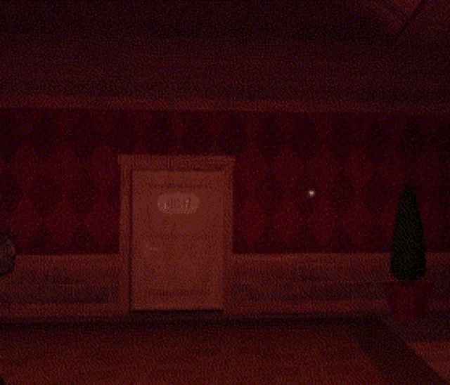 a silhouette of a person standing in a doorway in a dark room