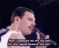 a man is singing into a microphone with the words also i suppose we are not bad for four aging queens are we