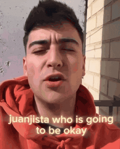juanjista who is going to be okay is written on the front of a man 's face