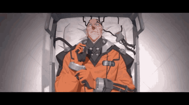 a man in an orange and black suit is laying in a hospital bed holding something