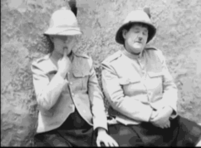 Laurel And Hardy Blow GIF - Laurel And Hardy Blow Hat GIFs