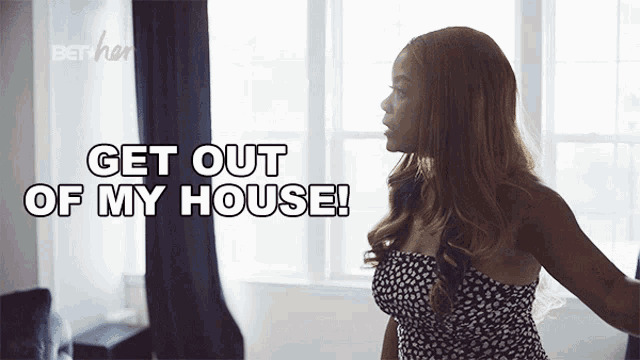 a woman is standing in front of a window with the words get out of my house above her