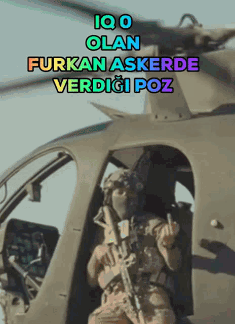 a soldier in a helicopter with the words iq o olan furkan askerde verdiği poz