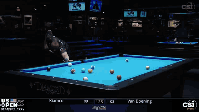 a pool table with a blue cloth says diamond on it