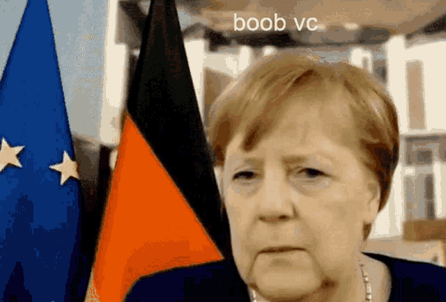 a close up of a woman 's face with the words boob vc visible