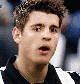 a close up of a man 's face with his mouth open and his eyes closed