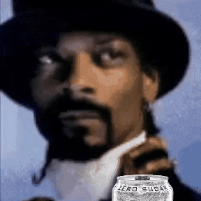 snoop dogg is holding a can of zero sugar soda .