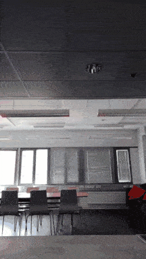 a classroom with a ceiling that has a hole in it that says ' a ' on it