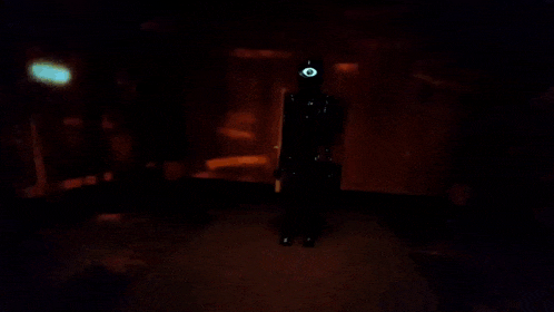 a dark room with a sign that says ' ecr ' on it