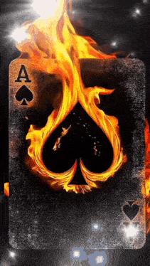 a playing card with the ace of spades on fire .