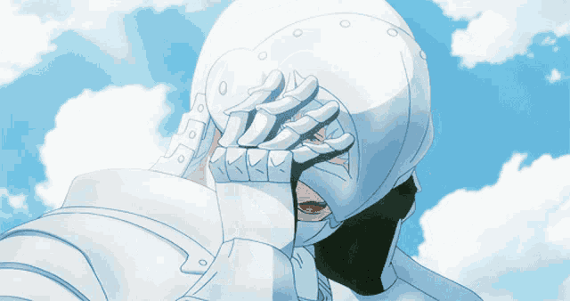 a person with a white helmet covering their face