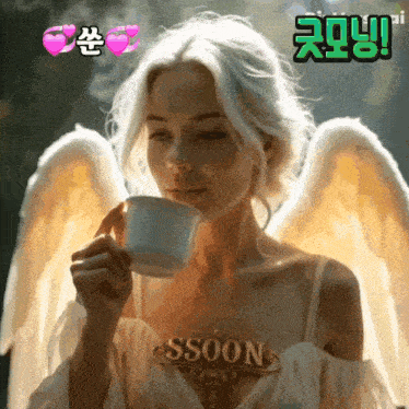 a woman with angel wings is drinking from a cup with the word soon on her chest