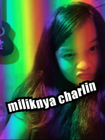 a girl with a rainbow background and the words " miliknya charlin " on the bottom