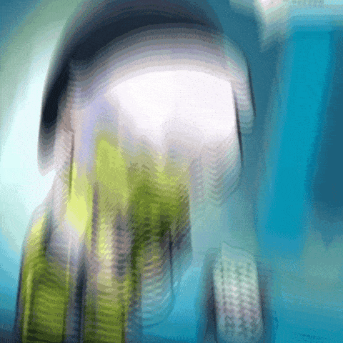 a blurred image of a person 's face with a telephone in the foreground