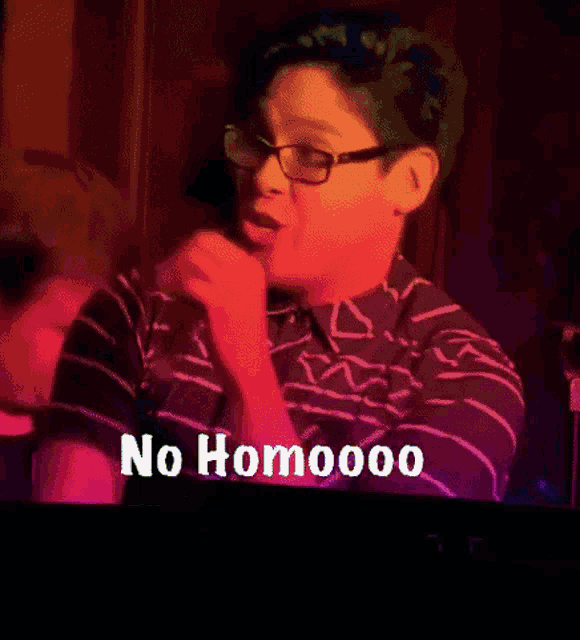 a man wearing glasses and a striped shirt says no homoo00
