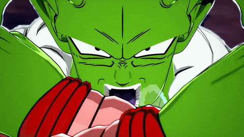a close up of a green cartoon character with red gloves on .