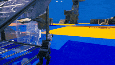 a person in a video game is standing on a blue and yellow floor