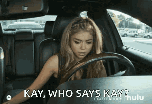 a woman in a car with kay who says kay