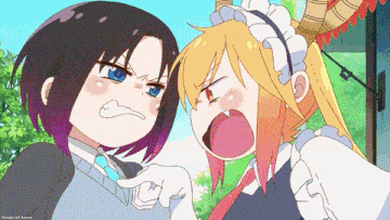 a couple of anime girls are standing next to each other and one is pointing at the other