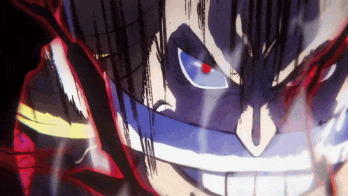 a close up of a man 's face with red eyes