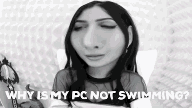 a black and white photo of a woman laying in bed with her eyes closed and the words `` why is my pc not swimming '' .