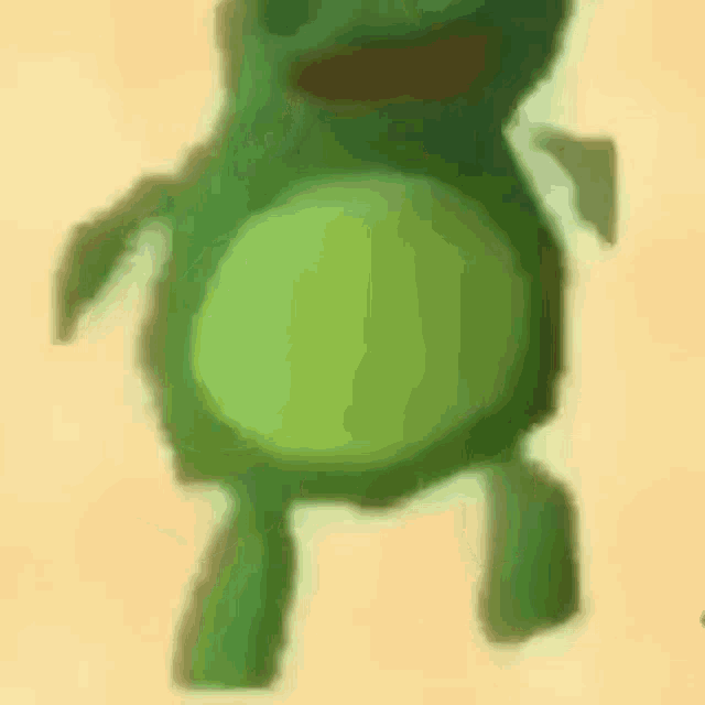a green frog with wings is flying in the air .
