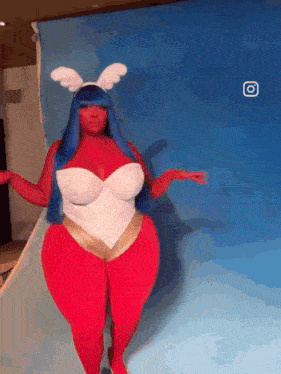a woman in a red white and blue costume with a blue background
