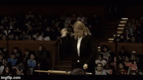 Conductor Female Conductor GIF - Conductor Female Conductor Orchestra GIFs