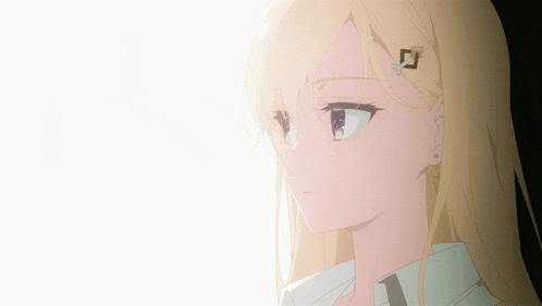 a girl with long blonde hair has a square in her hair clip