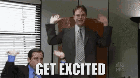 a man in a suit and tie is dancing in an office with the words `` get excited '' .