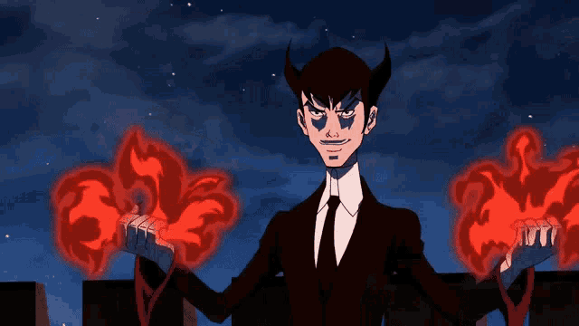 a man in a suit and tie is holding two red flames