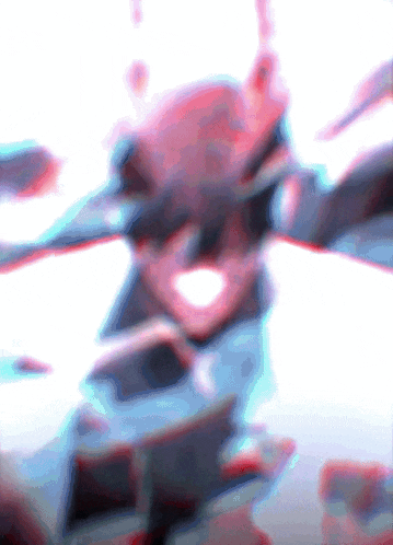 a blurry image of a person 's face with a red and blue background