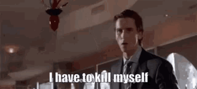 a man in a suit and tie says `` i have to kill myself '' .