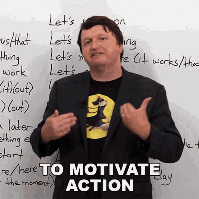 a man in a suit stands in front of a whiteboard that says " to motivate action "