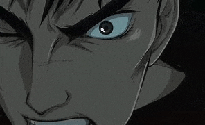 a close up of a cartoon character 's face with a very angry expression .