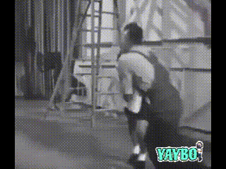a black and white photo of a man in a boxing ring that says yaybo