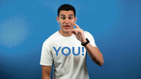 a man wearing a t-shirt that says you on it