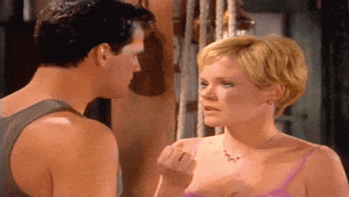 a man and a woman are talking to each other