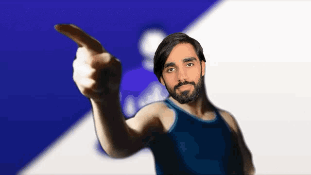 a man with a beard is pointing his finger