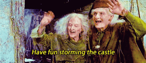 a man and woman are standing next to each other with the words `` have fun storming the castle '' above them .