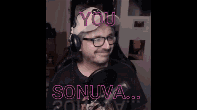 a man wearing headphones and a hat with the words you sonuva on it