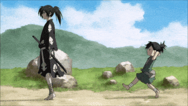a man with a sword is standing next to a little boy