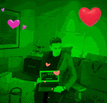 a man is holding a laptop with hearts around him and the words wawaoo nice written on the bottom