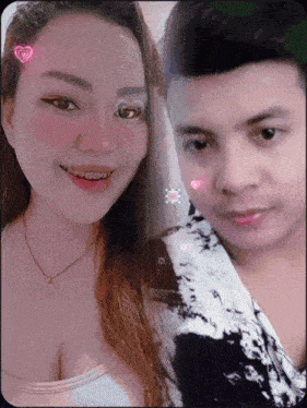 a man and a woman are posing for a picture together