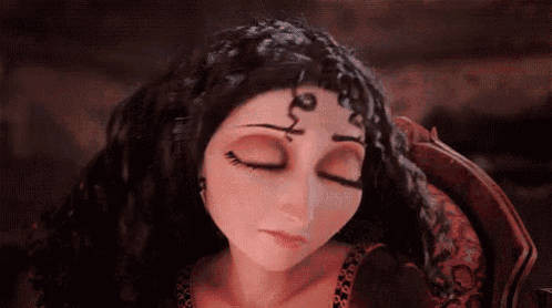 a close up of a woman 's face with her eyes closed and a wig on .