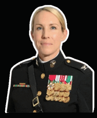 a woman wearing a military uniform with medals on her shoulder